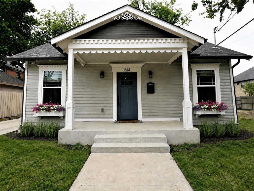 The 1920 Craftsman cottage at 1614 Hubert Street, seen from the front walk.
